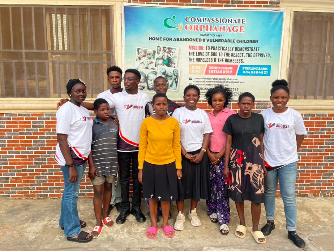 The August Mandate team and children gathered outside Compassionate Orphanage